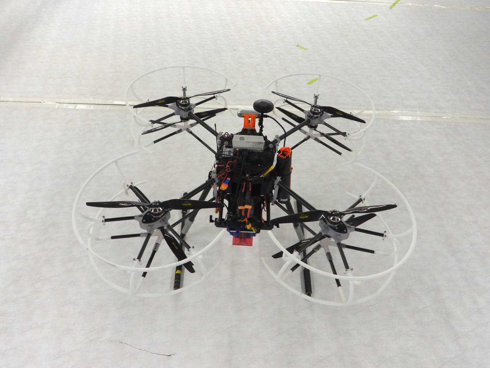 Top-down view of the delivery octarotor drone with eight rotors arranged around a central payload bay