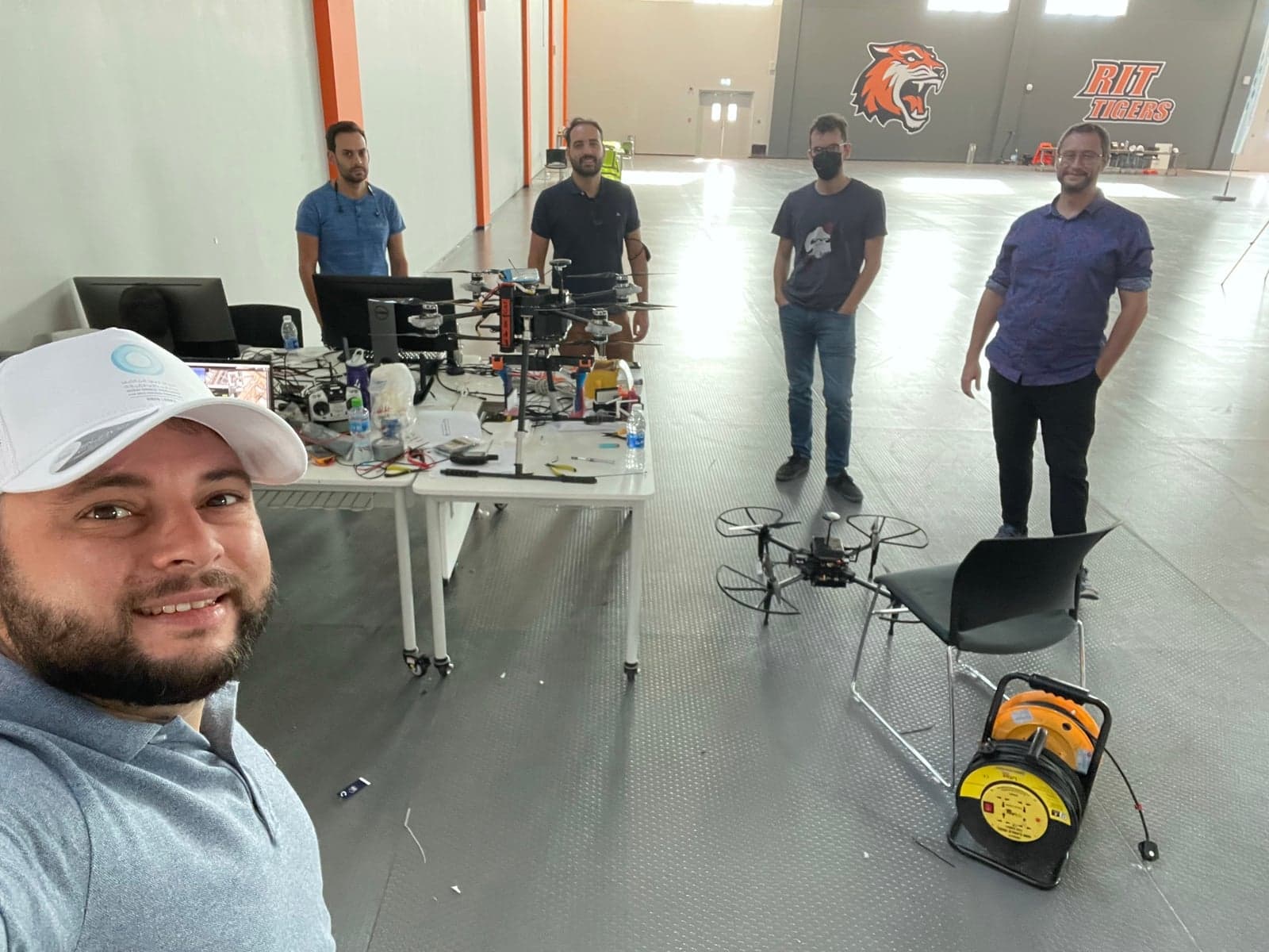 NYUAD team members with the delivery drone at the RTA competition test venue in Dubai