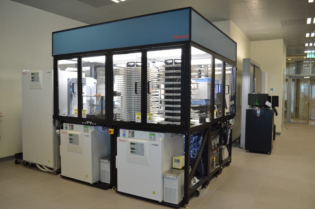 Thermo Scientific Cytomat automated incubator cabinets beneath the glass-fronted HTS robotic enclosure