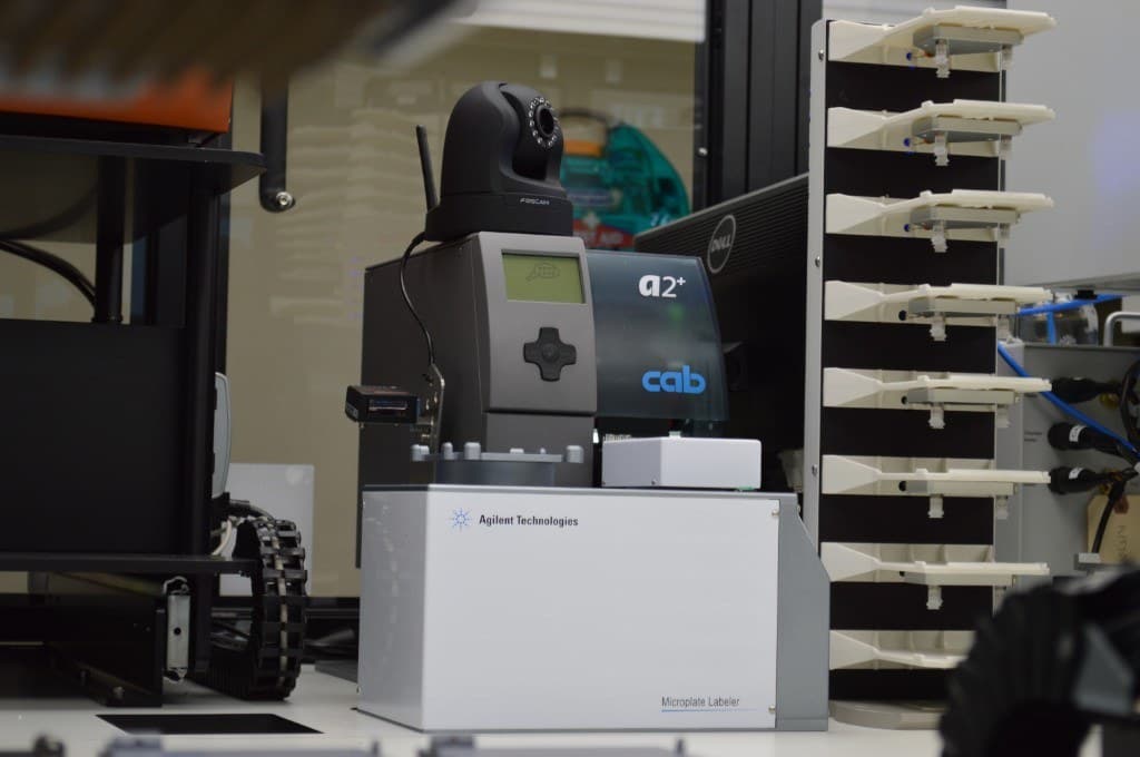 Agilent Microplate Labeler with cab a2+ printer, Foscam camera, and plate stacker on the HTS bench